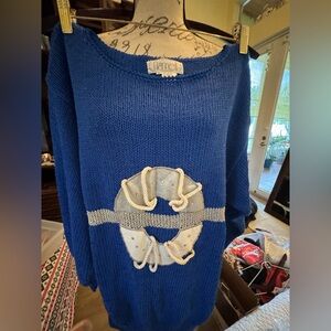 Nannell beautiful vintage sweater small but can fit m-l excellent shape!